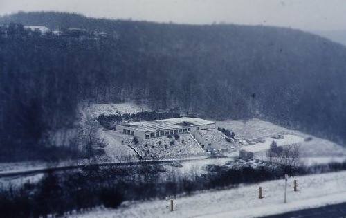  Looking downhill, to the right, behind building 210