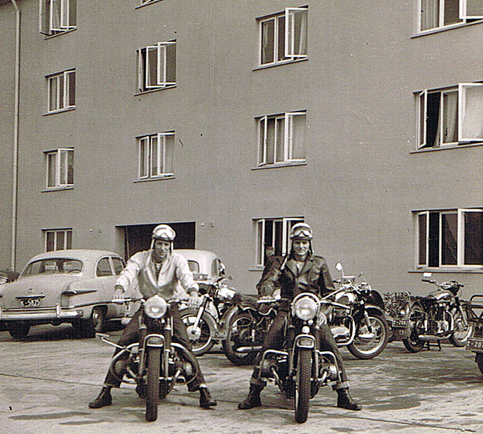 Sembach AB, 1959. Tom Nigl on his 1953 600cc BMW and Cass Cowell on his 1952 500cc BMW in front of the 6910th RGM.