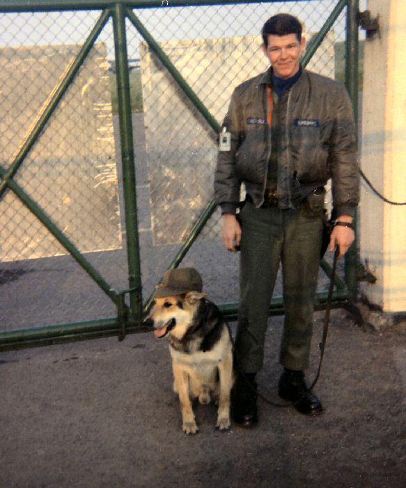 K9 handler Bill Zimmerman, circa 1967, Sembach AB K9 area.